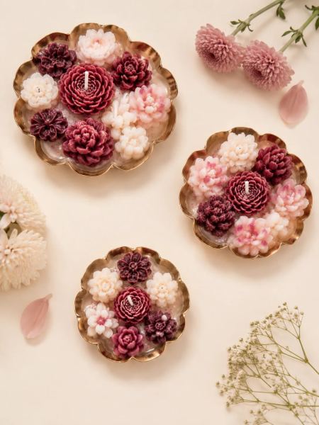 Handcrafted Floral Urli Candle Set of 3 – Decorative Metal Urli Bowls with Wax Flower Art