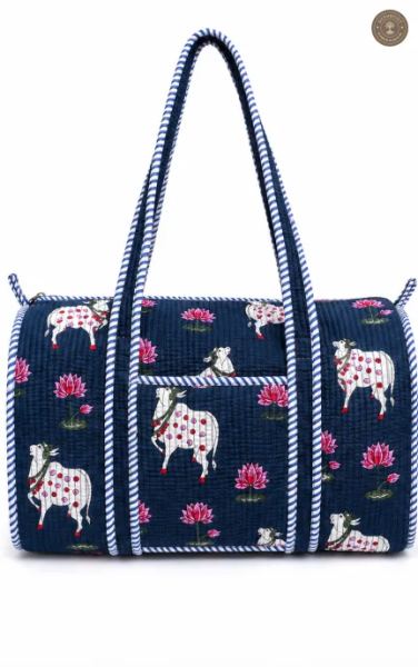 Handcrafted Quilted Blue Cotton Duffel Bag with Animal Print