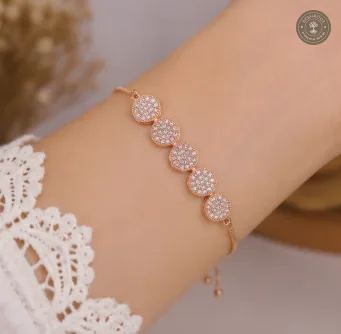 Rose Gold Polish Designer Bracelet with Round Stone Detailing