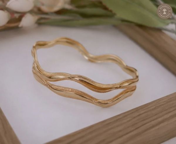 Elegant Wavy Golden Finish Designer Bangles