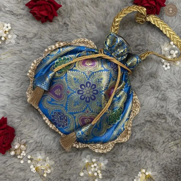 Firozi Blue Eccentric Lace Potli Bag