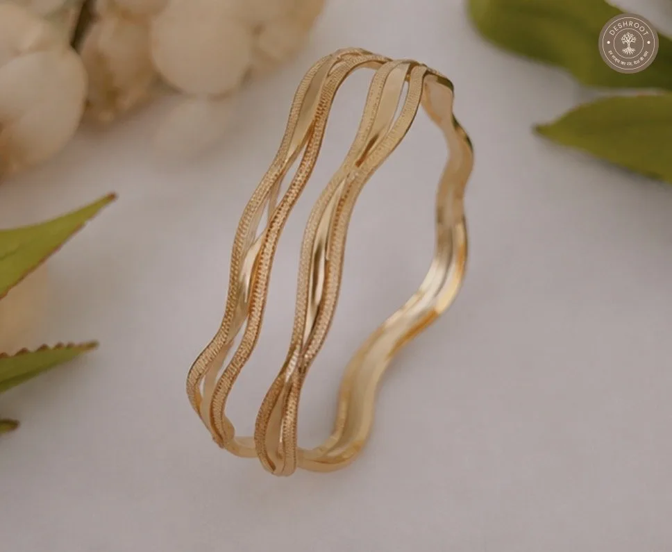 Elegant Wavy Golden Finish Designer Bangles