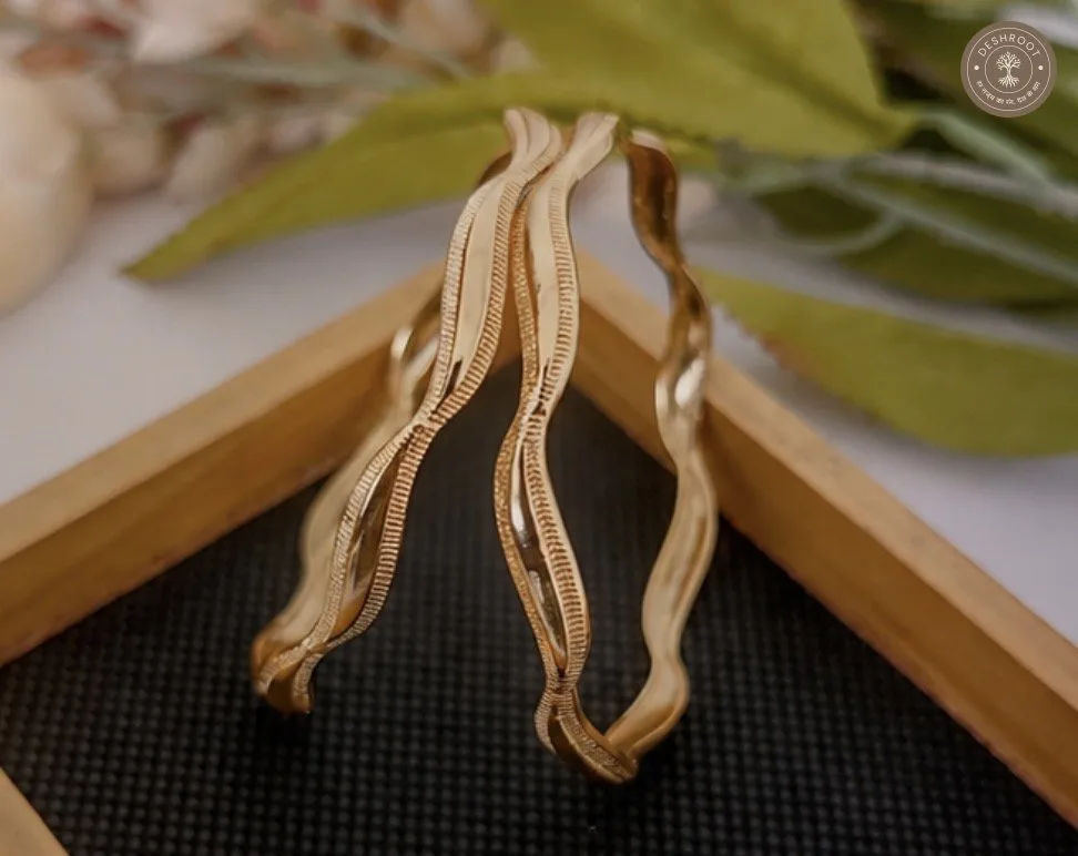 Elegant Wavy Golden Finish Designer Bangles