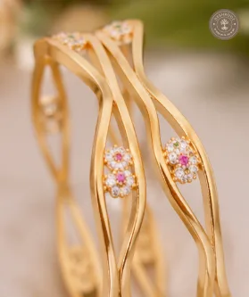 A.D. Diamond Micro Polish High Golden Bangles with Floral Stone Detailing