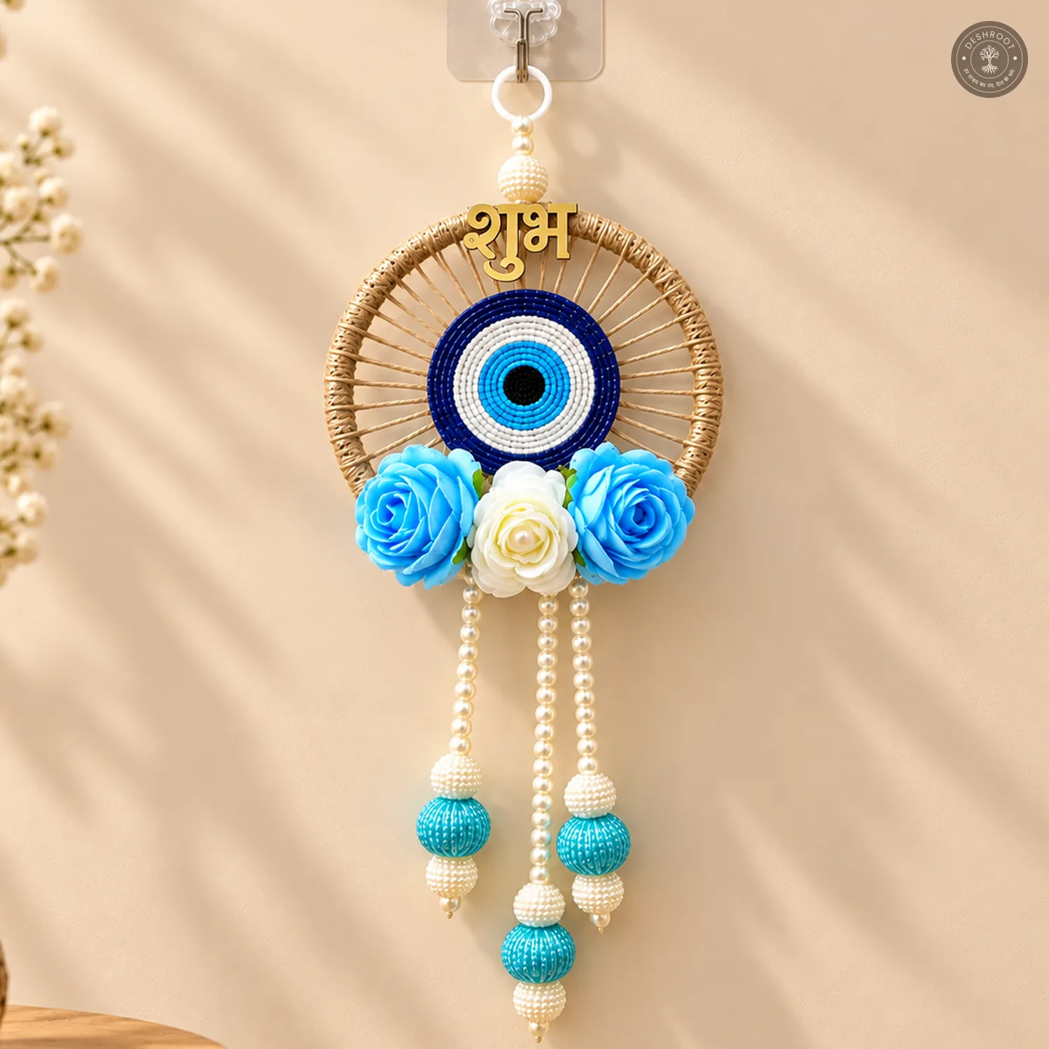 Blue and white evil eye wall hanging
