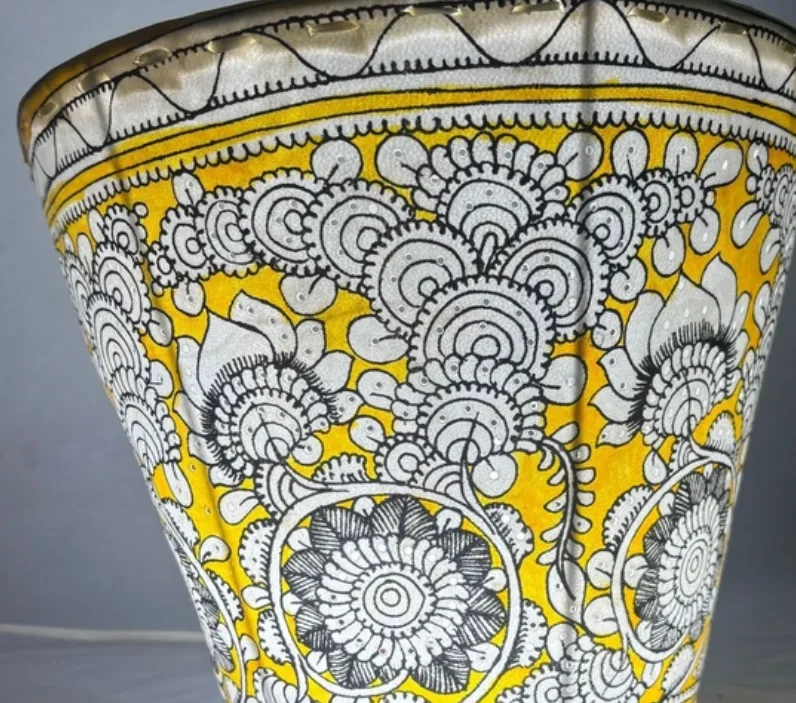 Tholubommalata 8-Inch Yellow Leather Wall Lamp