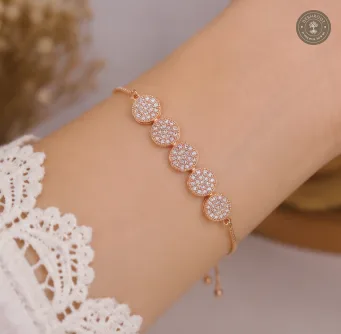 Rose Gold Polish Designer Bracelet with Round Stone Detailing