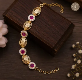 Traditional Gold-Tone Hand Gajra with Magenta Stones