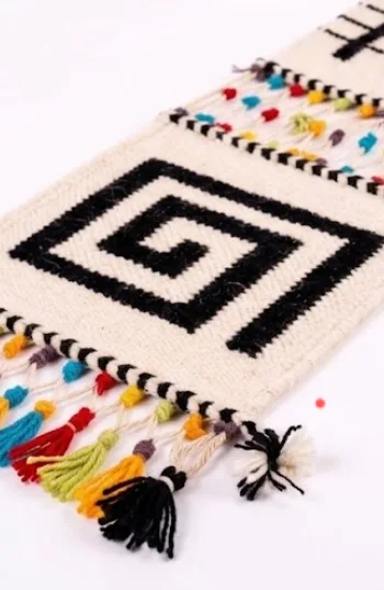 Handwoven Geometric Wall Hanging with Colorful Tassel Accents